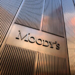 Moody's report highlights risks of cryptocurrency adoption in developing countries, affecting monetary policy and financial stability.