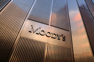 Moody's report highlights risks of cryptocurrency adoption in developing countries, affecting monetary policy and financial stability.