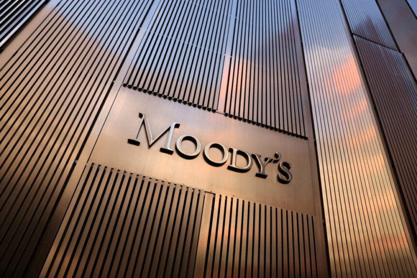 Moody's report highlights risks of cryptocurrency adoption in developing countries, affecting monetary policy and financial stability.