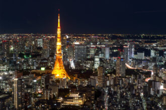 Bybit crypto exchange logo with Japan flag, referencing new user registration pause